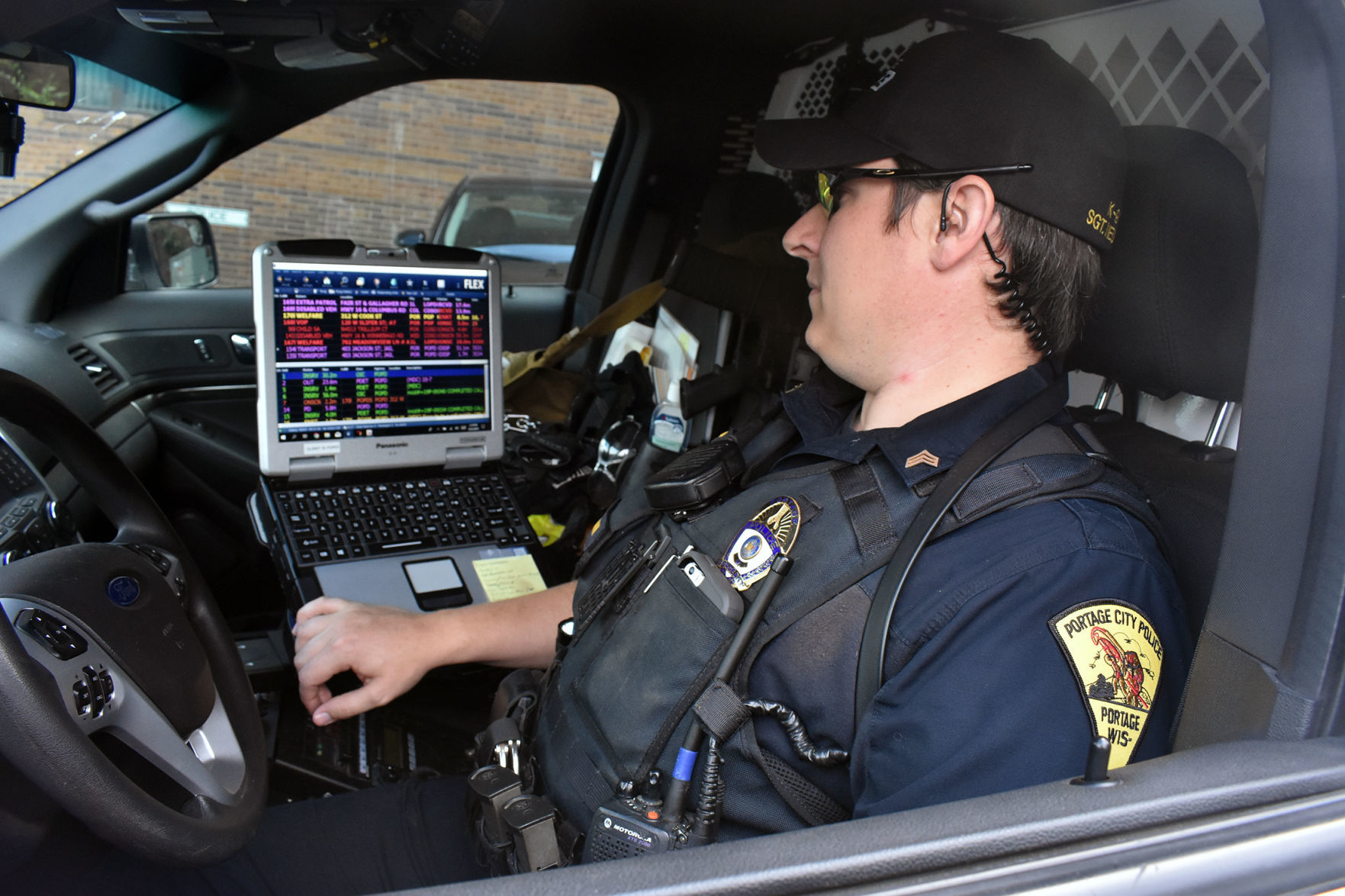 Sgt. Ben Neumann in squad vehicle